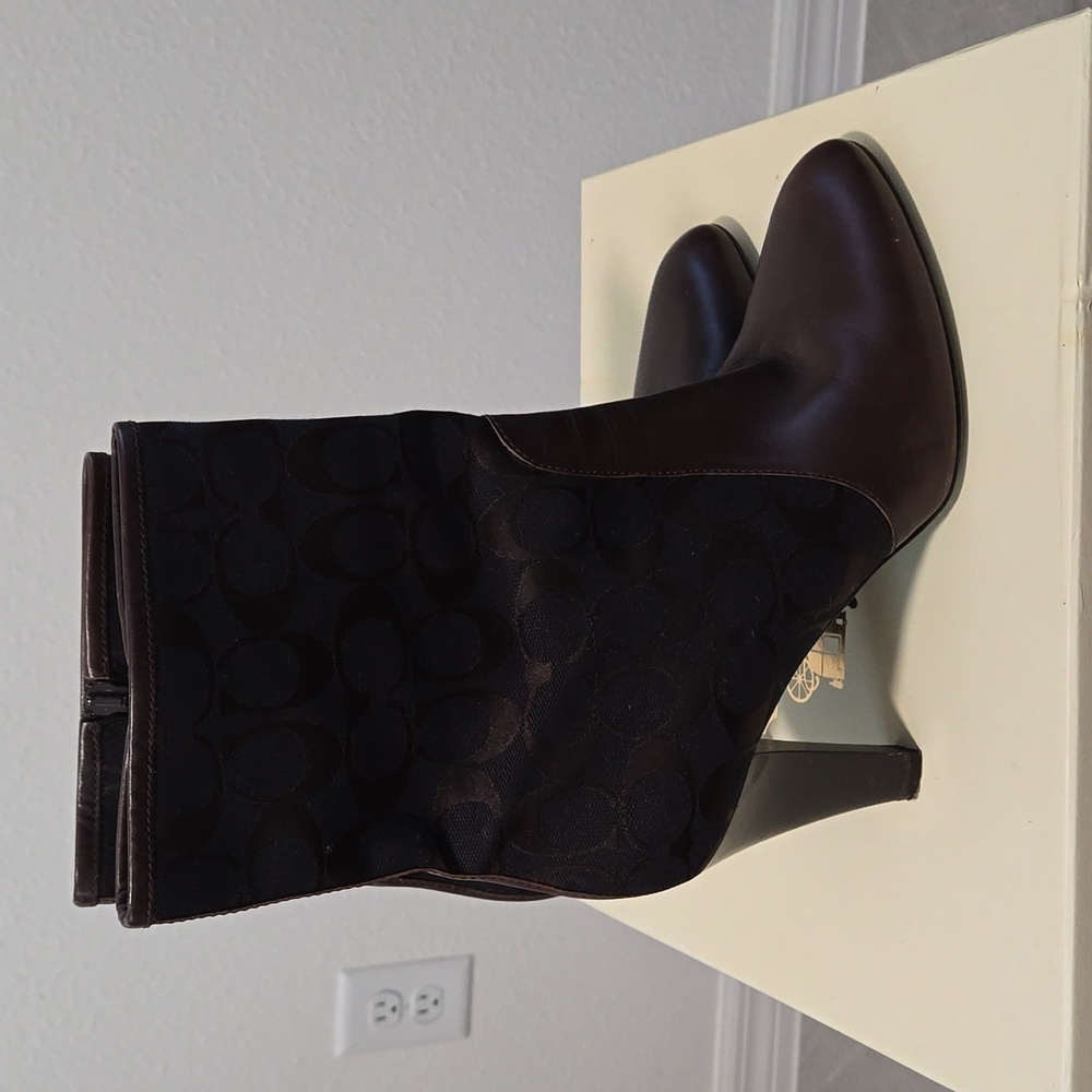 Brown and black coach boots